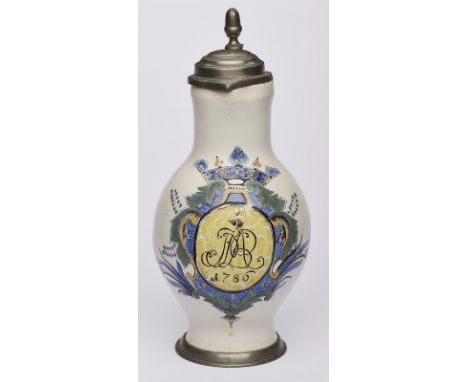 Birnkrug, süddt. datiert 1786.Wandung m. polychromem Wappenschild, darin Doppelmonogramm, Deckel u. Fußring m. Zinnmontierung