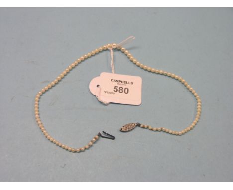 A cultured pearl necklace, graduated pearls on 9ct. white gold mount 