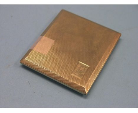 An engine-turned 9ct. gold cigarette case, Birmingham 1931, 102 grams gross total