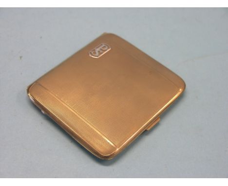 A 9ct. gold cigarette case, engine-turned and initialled, London 1928, 87.9 grams