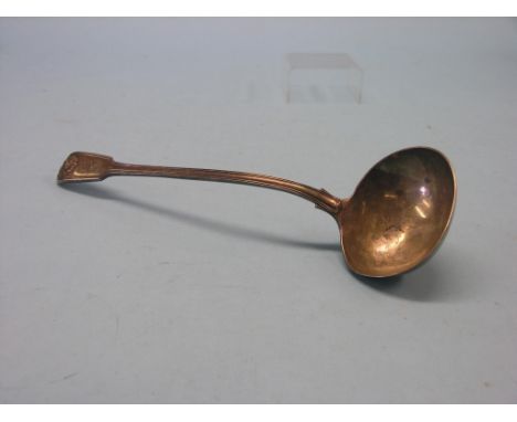 A William IV silver soup ladle, fiddle, thread and shell pattern, London 1835, approx. 10.5oz.