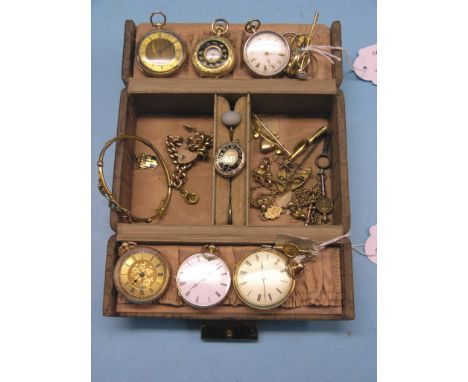 A small jewellery box containing six gold-yellow metal pocket watches, an 18ct. gold signet ring, engraved platinum wedding r