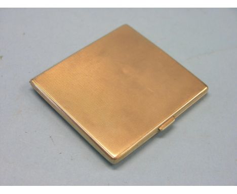 An engine-turned 9ct. gold cigarette case, Chester 1931, 72.2 grams - personalised
