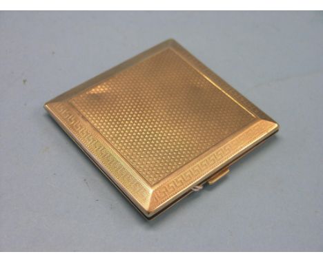 An engine-turned 9ct. gold cigarette case, Birmingham 1927, 96.8 grams