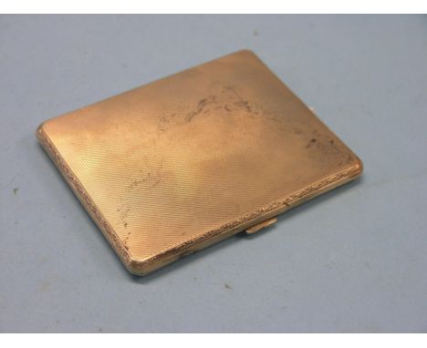 An engine-turned 9ct. gold cigarette case, Chester 1929, 108 grams