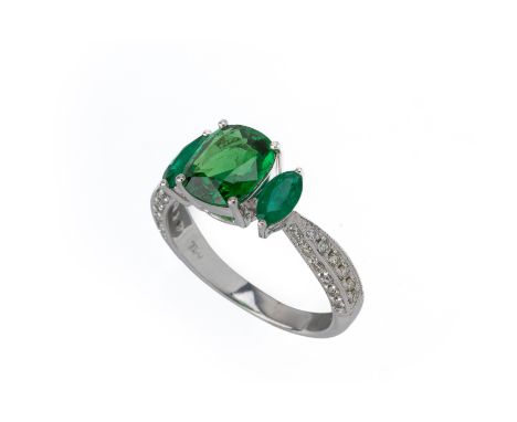 A TSAVORITE, EMERALD AND DIAMOND RING
Set in 18k white gold, the step cut natural tsavorite flanked by two marquise cut emera