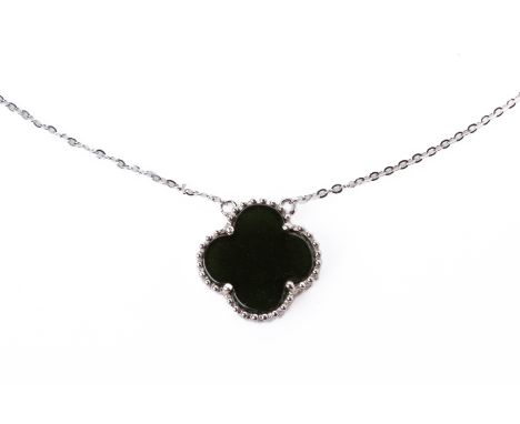 AN OMPHACITE JADE PENDANT NECKLACE
In 18k white gold, the quatrefoil shaped pendant on trace chain
The chain marked 'Au750'

