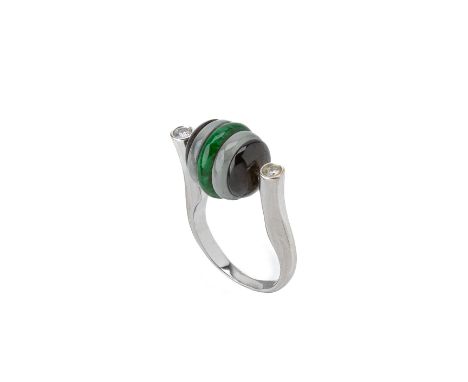 A JADE, HARDSTONE AND DIAMOND RING
Set in 18k white gold, with two bezel set round brilliant cut diamonds to either side of t