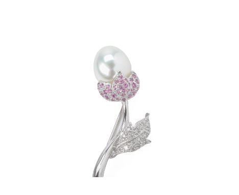 A SOUTH SEA CULTURED PEARL, RUBY AND DIAMOND BROOCH
Of foliate design in 18k white gold, with a single pearl and pave set rub