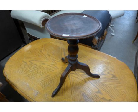 An oak tripod wine table