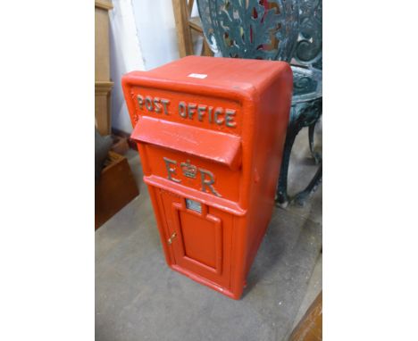 A red Post Office letter box