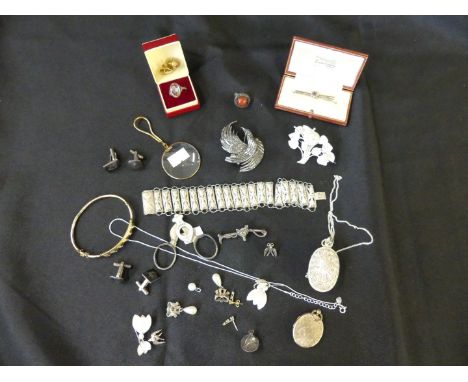 A selection of jewelleryTo include a cased bar brooch, stamped 9ct, white metal filigree jewellery, marcasite jewellery, a ye