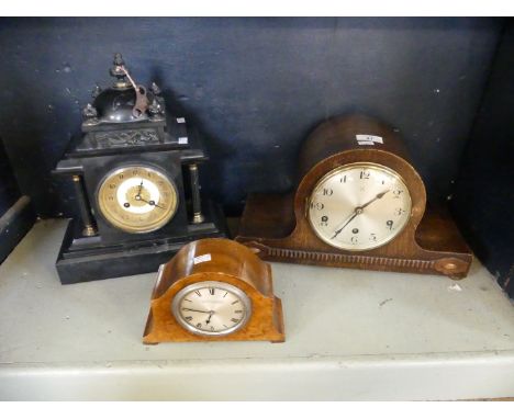 A mixed lot comprising a Victorian black slate mantel clock, an early 20th Century oak cased mantel clock and a further small
