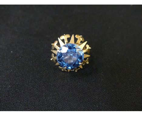 A blue paste dress ringThe circular blue paste within an openwork surround, ring size K, weight approx. 7.2g. 