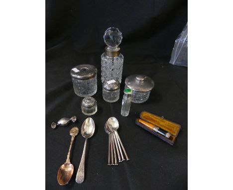 A mixed lot of various silver topped dressing table jars, assorted cutlery, cheroot holder and other items 