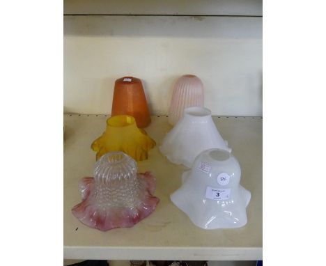 A collection of six various late 19th/early 20th Century glass light shades to include cranberry tinted example, ribbed peach