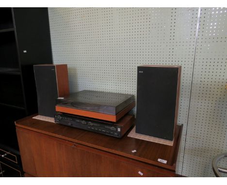 A vintage Bang & Olufsen Beogram 1203 record player together with  a Beolab 1700 and a pair of Beovox S30 speakers 