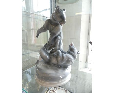 A Zsolnay Pecs model of two fighting bears finished in grey glaze, marked with designers name Markap Bela dated 1911 to rever