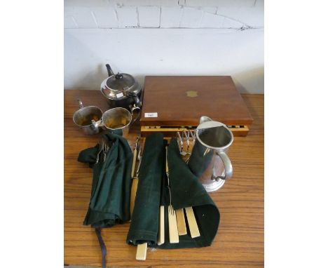 A mixed lot of various silver-plated items comprising tea set, cased cutlery, toast rack plus further fabric rolls of cutlery