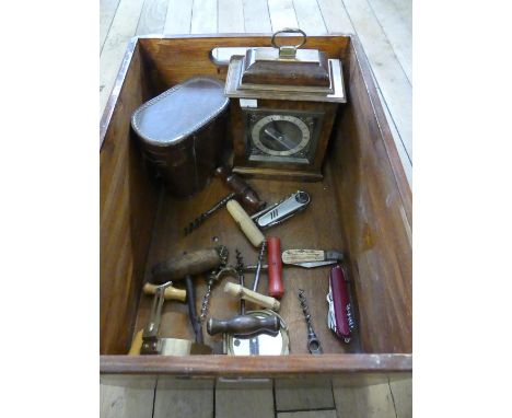 A mixed lot of various corkscrews, pocket knives, walnut cased mantel clock and binoculars 