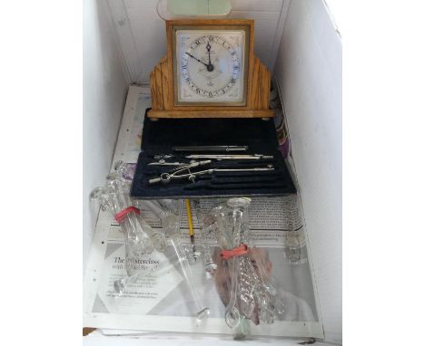 A collection of antique glass stirrers together with a cased drawing set and a small Terry & Co oak cased mantel clock 