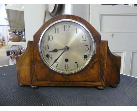 A early 20th Century walnut cased dome topped mantel clock 