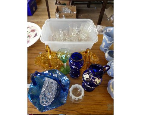 A mixed lot of various assorted glasswares to include a range of  various 19th Century clear glass custard cups, further colo