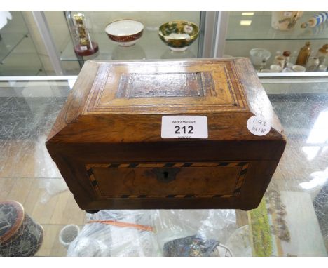 A 19th Century walnut veneered and inlaid tea caddy of hinged rectangular form 