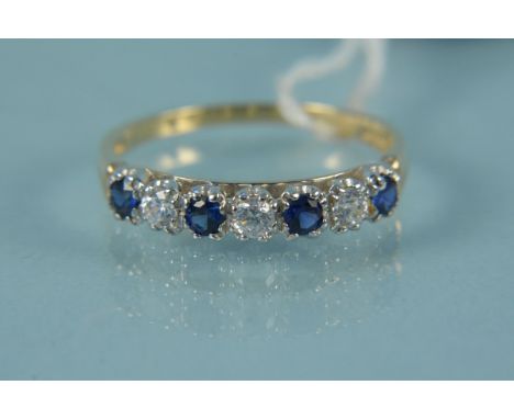 A 14ct gold blue and white stone set ring, size T 1/2, weight approx 2.5g