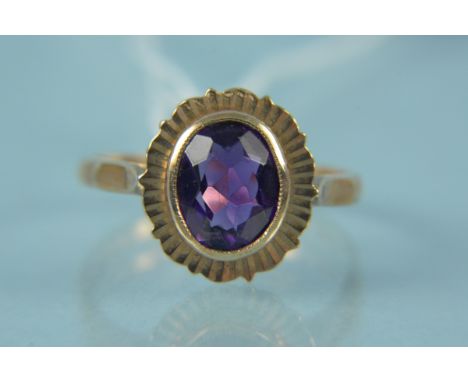 A 9ct gold single amethyst set ring with flared border, size R, weight approx 3.5g