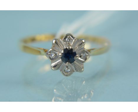 An 18ct gold sapphire and diamond set ring, size M, weight approx 2g