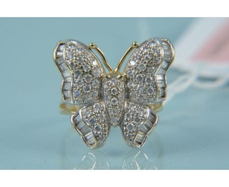 A 9ct gold butterfly form ring set with round and baguette cut white stones, size R, weight approx 4.5g