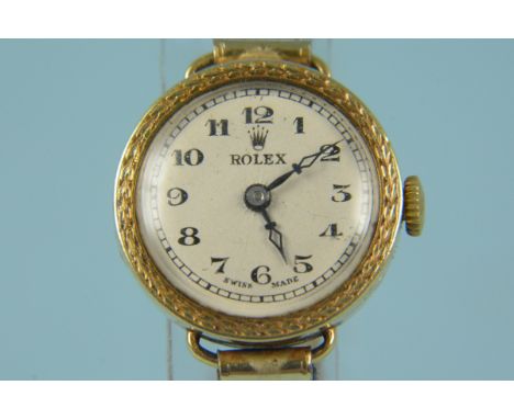 A c1950's lady's 18ct gold cased Rolex watch on rolled gold bracelet