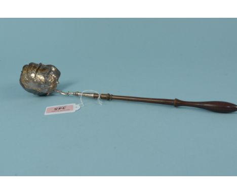 A Georgian silver toddy ladle decorated with floral detail and engraved initials, hallmarked to bowl London 1763, makers mark