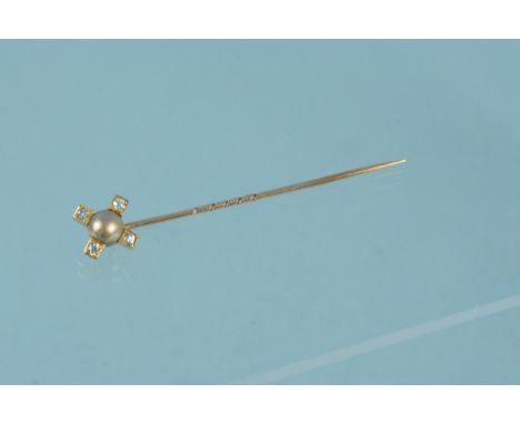 A yellow metal pearl and diamond set stick pin