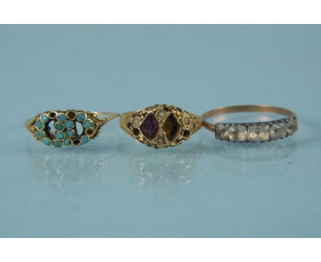 A 15ct gold ring, weight approx 1.5g (as found) together with two yellow metal rings, one set with turquoise stones (some mis