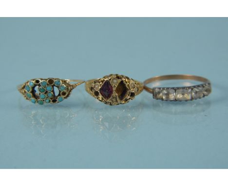 A 15ct gold ring, weight approx 1.5g (as found) together with two yellow metal rings, one set with turquoise stones (some mis