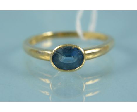 An 18ct gold single blue stone set ring, size Q, weight approx 3.5g