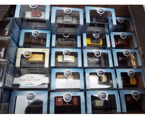 Oxford Automobile Company - 28 diecast 1:76 scale model motor vehicles, mint in original plastic cases with card sleeves and 