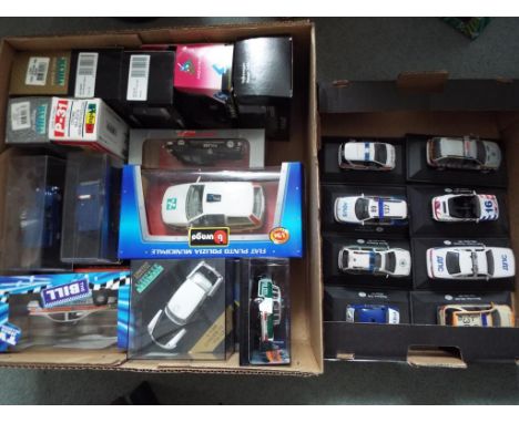 A collection of 27 diecast scale model Police vehicles, UK, American and other nationalities, all mint of which 19 in origina