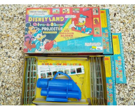 Chad Valley - Disney Land 'Give-a-Show' battery operated Projector  with 112 colour slides in original box, and three additio