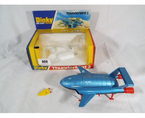 Dinky - Dinky Toys model No. 106 Thunderbird 2 metallic light blue body with model of Thunderbird 4 included, model appears e