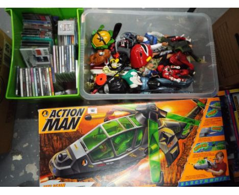 A good mixed lot to include a vintage Heligun Maxicopter by Action Man, boxed. A quantity of vintage Power Rangers, Action Me