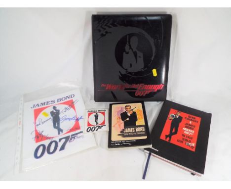 James Bond 007 - A folder entitled "The World is not Enough 007" containing a collection of approx. 360 collectors cards, a J
