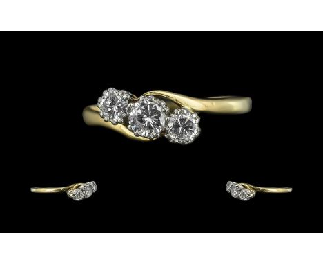 18ct Gold - Platinum 3 Stone Diamond Set Ring. Marked 18ct and Platinum to Interior of Shank. The Round Faceted Diamonds of G