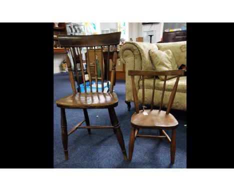 Antique Victorian Windsor Armchair, stick back, turned legs and decoration.  Measures 33" high x 17" wide x 17" deep.  Togeth