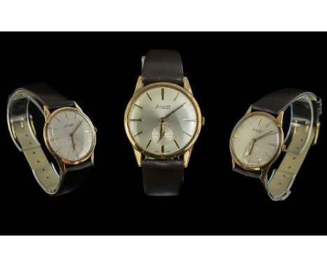 9ct Gold Gent's Accurist Wrist Watch, 21 jewel manual wind, silvered dial with baton numerals.  Leather strap.  Measures 33 m