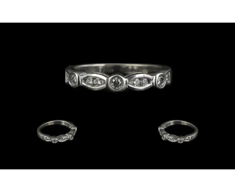 18ct Half Eternity Ring set with round brilliant cut diamonds in a rub over and channel set Ring size K