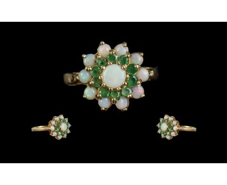 Ladies 9ct Gold Opal and Emerald Set Ring. Full Hallmark to Shank,. Flower head Design. Well Matched Opals. Ring Size P - Q. 