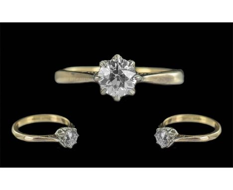 18ct Gold and Platinum Single Stone Diamond Ring. Marked 18ct and Platinum to Shank. The Round Brilliant Cut Diamond of Excel